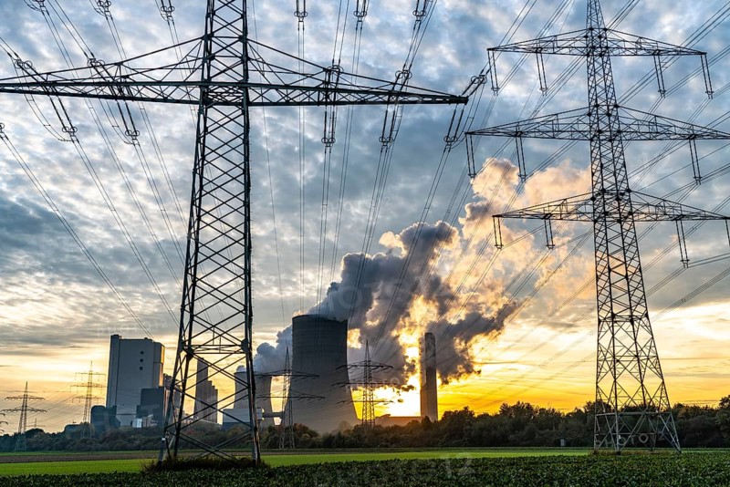 Lignite-fired power plant, RWE Power AG Niederaussem power plant, sunset, Bergheim, North Rhine-Westphalia, Germany, Europe