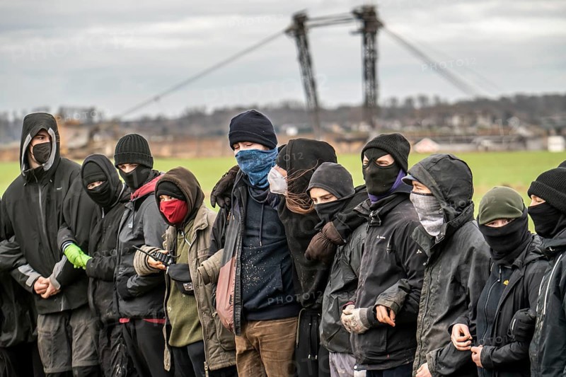 Start of the eviction of the hamlet Lützerath at the lignite mine Garzweiler 2, activists try to obstruct the preparation for the upcoming eviction of the site, which is occupied by climate protection activists, the energy company RWE prepares the construction of work roads, protected by the police, North Rhine-Westphalia, Germany, Europe