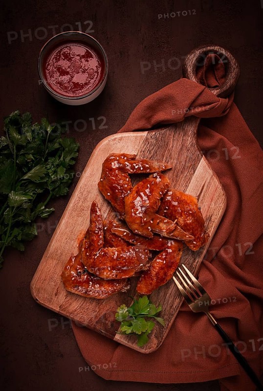 Chicken wings, with barbecue sauce, with tomato sauce, fast food, no people