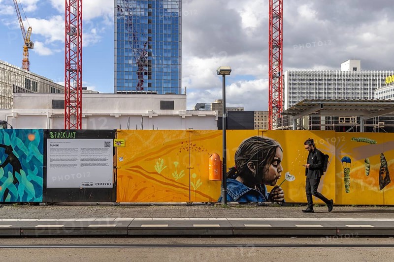 Construction site, construction fence and crane at Alexanderplatz in Berlin, Germany, Europe
