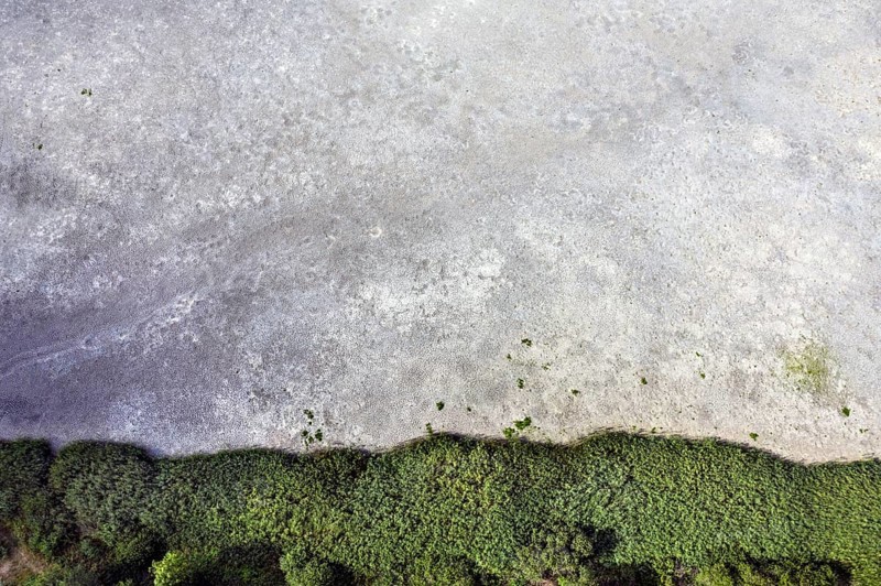 Aerial view of dried up fish ponds in Reckahn in Brandenburg. The Plane, a river that normally fills the fish ponds with water, is dry and no longer carries water, 09/08/2022