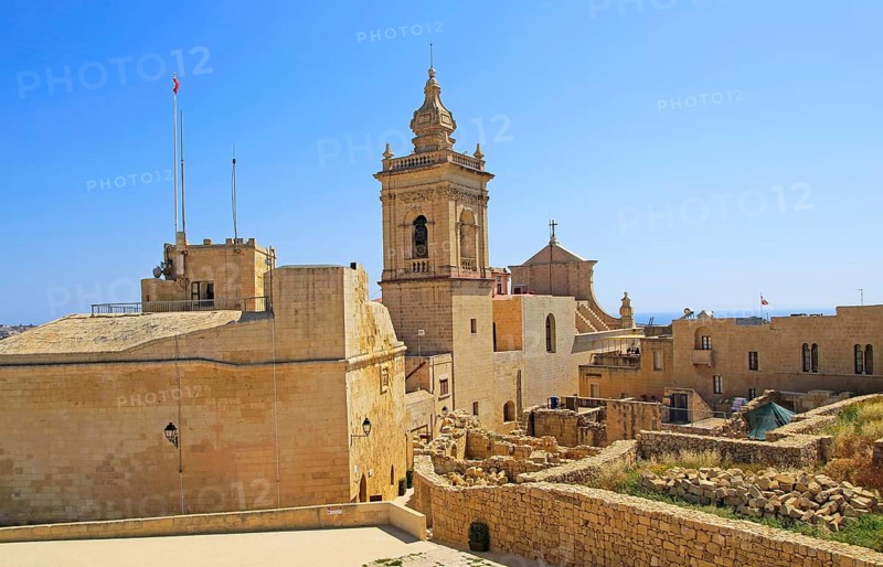 Cathedral church tower and ruins inside citadel castle walls Il-Kastell, Victoria Rabat, Gozo, Malta, Europe
