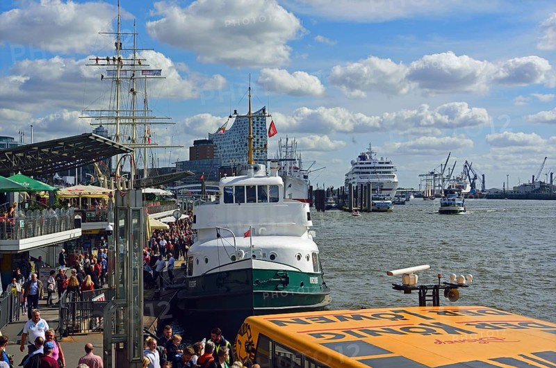 Europe, Germany, Hanseatic City of Hamburg, Elbe, Elbe Philharmonic Hall, glass facade, harbour tour with harbour ferry, many tourists, passenger ship Europa at the Überseebrücke, Europe