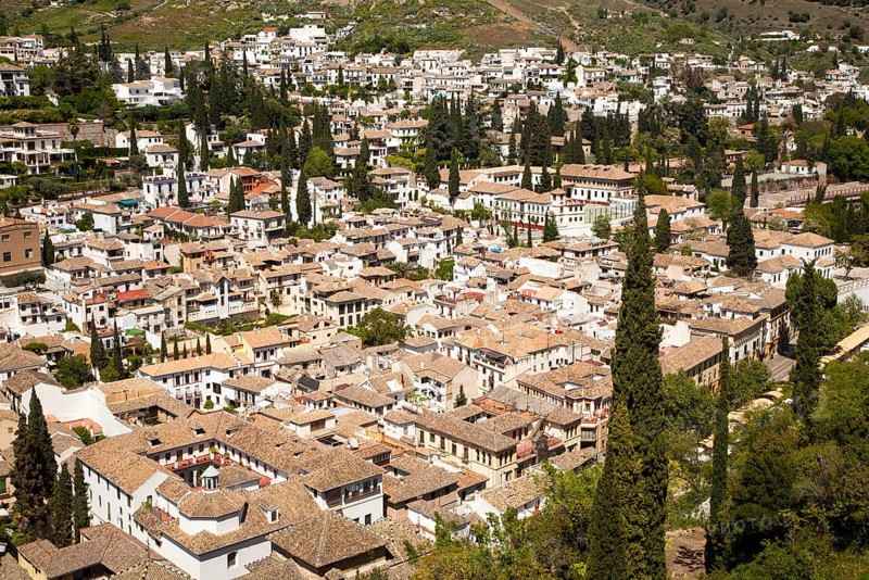 View of historic Moorish buildings in the Albaicin district of Granada, Spain seen from the Alhambra