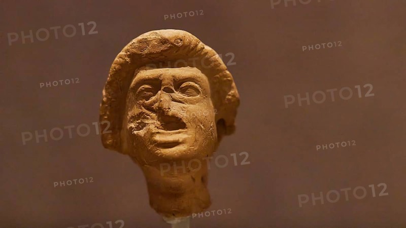 Theatre mask, statuette of a human face made of clay with accentuated facial expressions, Archaeological Museum, Archea Korinthos, Corinth, Peloponnese, Greece, Europe