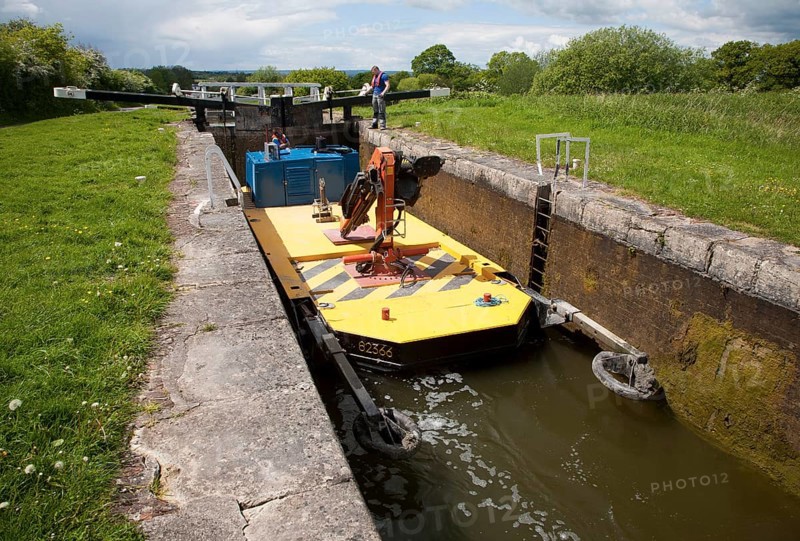 Maintenance boat at Caen Hill flight of locks on the Kennet and Avon canal Devizes, Wiltshire, England, United Kingdom, Europe