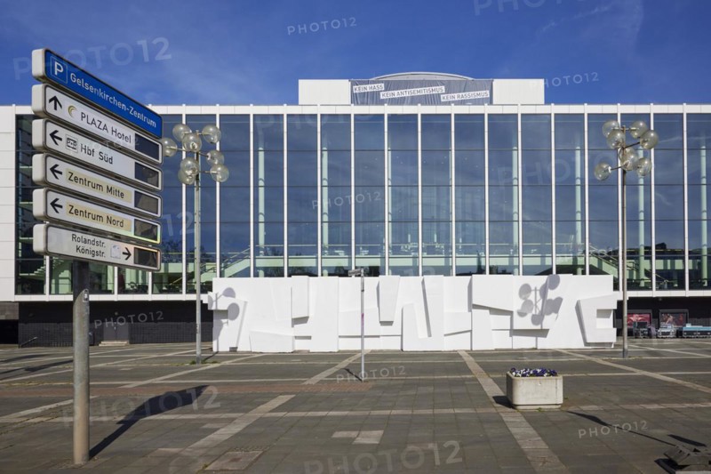 Front of the Musiktheater im Revier in front of a blue sky with lanterns and signs of the parking guidance system to the centre, main station and Plaza Hotel in Gelsenkirchen, Ruhr area, independent city, North Rhine-Westphalia, Germany, Europe