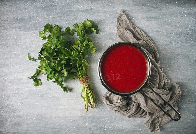 Tomato sauce with pepper and spices, Satsebeli, Georgian cuisine, red sauce, top view, homemade, no people, on a gray background