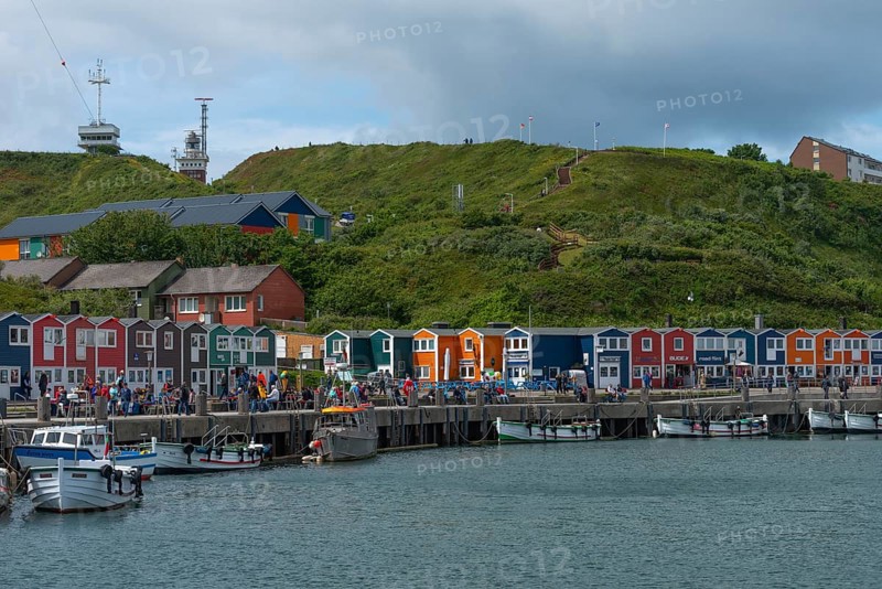 Colourful lobster shacks on the promenade in the lowlands, Börteboote, offshore island of Heligoland, hospital in the midlands, cliff coast, North Sea, Pinneberg district, Schleswig-Holstein, Germany, Europe