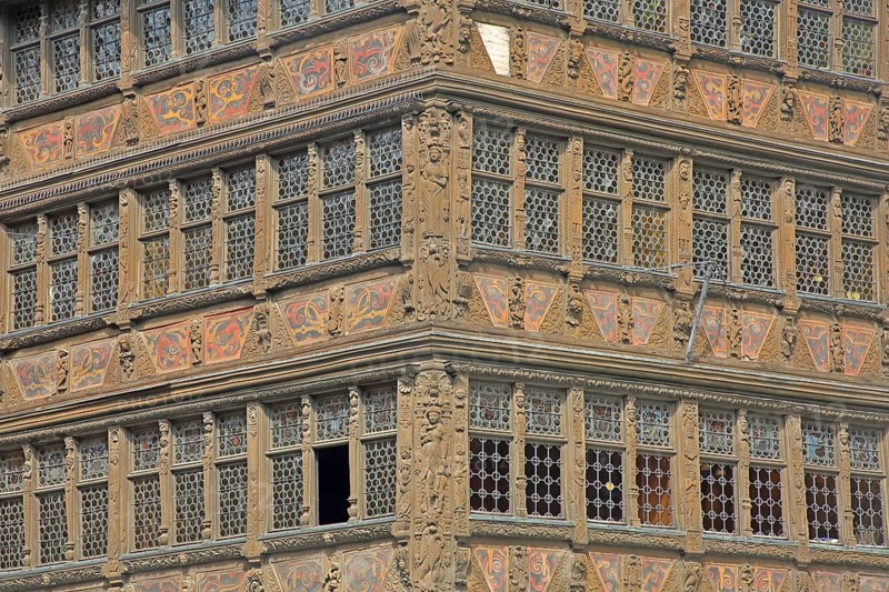 Facade of Maison Kammerzell built in 1427, historic half-timbered house with decorations, wood carvings, arts and crafts, window, open, opened, closed, to, row, series, detail, cathedral square, Grande Île, Strasbourg, Bas-Rhin, Alsace, France, Europe