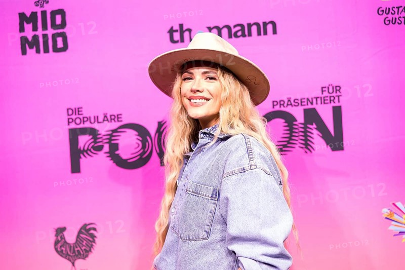 Anne West (Anne Heinz) on the red carpet in front of the Polyton 2024 award ceremony in Berlin's Atelier Gardens on 23 October 2024. The award has been held since 2023 and is a successor to the Echo music award