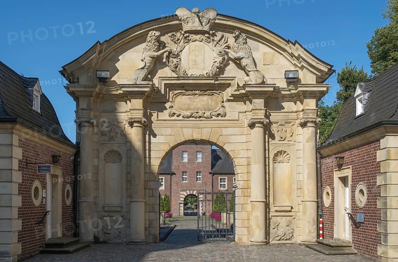 Ahaus Baroque and moated castle, magnificent portal, today the seat of the Ahaus Technical Academy, Ahaus, Münsterland, North Rhine-Westphalia, Germany, Europe