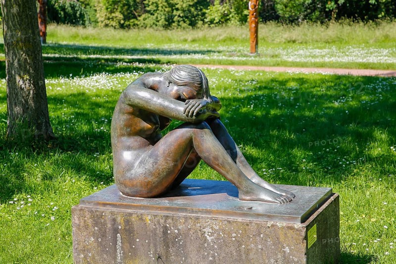 Public art, sculpture by Hermann-Christian Zimmerle sculptor, nude Eva, female figure, bronze sculpture, castle garden, castle park, Varbüler castle, Hemmingen castle, Hemmingen, Ludwigsburg district, Baden-Württemberg, Germany, Europe