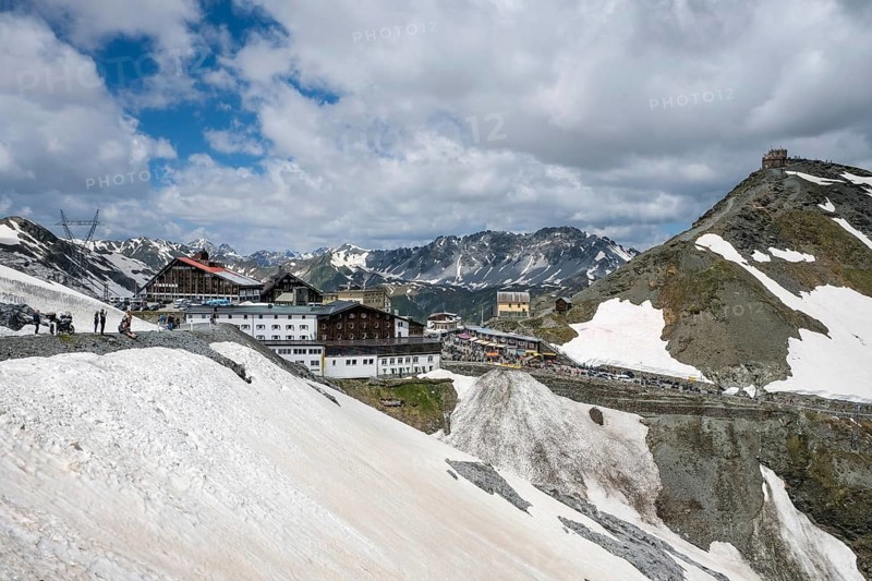 Stilfserjoch, Vinchgau, South Tyrol, Italy, Stilfser Joch pass road, rest area with catering, restaurants and hotels at the top of the pass road, snow-covered mountain landscape of the Swiss Alps in the background, Europe
