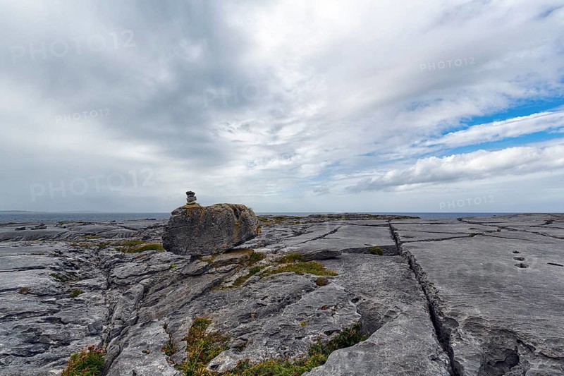 Bizarrely shaped limestone slabs, hiking trail, stone stacks on coastline, limestone coast of the Burren, Murrooghtoohy viewpoint, County Clare, Wild Atlantic Way, Atlantic Ocean, Ireland, Europe