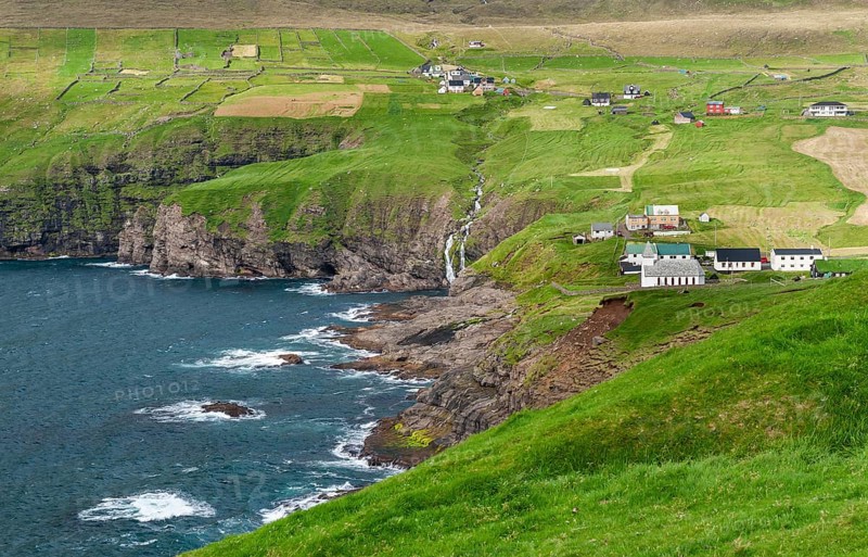 Fields and village on rocky coast, Vidareidi, Vidoy Island, Viðareiði, Viðoy Island, Faroe Islands, Denmark, Europe