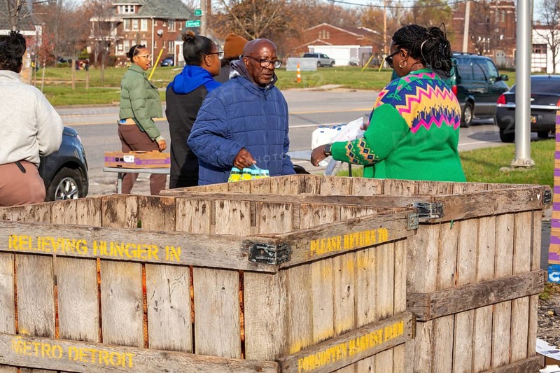 Detroit, Michigan - The nonprofit Forgotten Harvest distributes free food to residents of a low-income neighborhood on the week before Thanksgiving.