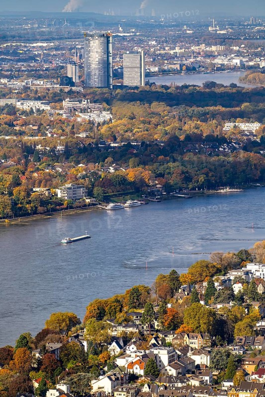 Bonn skyline on the Rhine, UNFCCC Secretariat of the Framework Convention on Climate Change, United Nations skyscraper, Bonn campus, Posttower, Deutsche Post headquarters, coal-fired power stations in the lignite mining area in the background, North Rhine-Westphalia, Germany, Europe