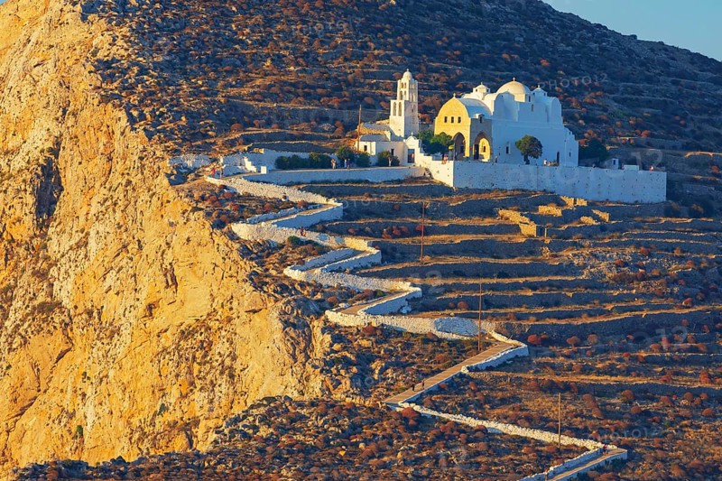 View of Panagia Kimissis church built on a cliff above the sea, Chora, Folegandros Island, Cyclades Islands, Greece, Europe