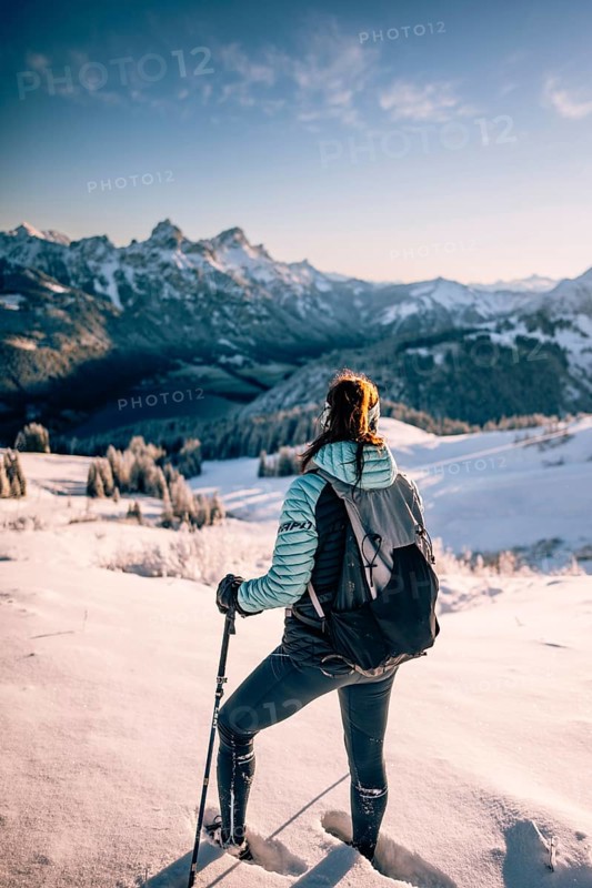 Hiking in the snow in the snow-covered winder landscape in the Alps at Neunerköpfle in the Tannheimer Tal in Tyrol, Austria, Europe