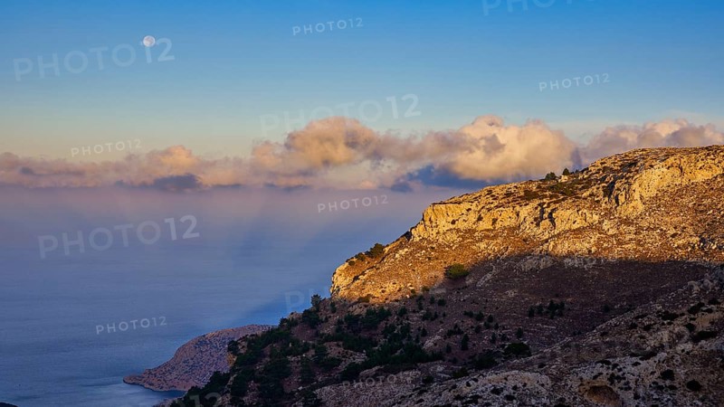 Coastal landscape with moonset and fascinating cloud formations, Morning mountain landscape, Lastos, Island centre, Karpathos, Dodecanese, Greek Islands, Greece, Europe