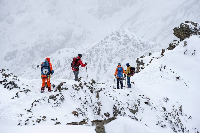 Kit tourers on the summit of the Köllkuppe or Cima Marmota, snow-covered mountain landscape, Ortler Alps, Vinschgau Valley, Italy, Europe