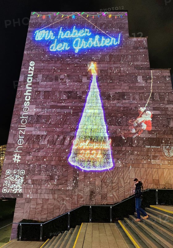 Digital projection of a Christmas tree on the gable wall of the City and State Library on the Katharinentreppe, Dortmund, Germany, Europe