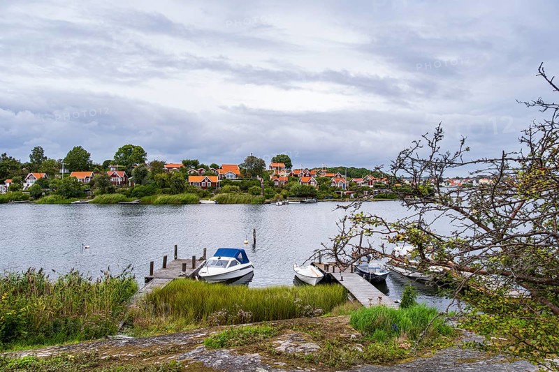 View from the island of Saltö to the famous allotment garden colony Brändaholm on the island of Dragsö in the archipelago of Karlskrona, Blekinge län, Sweden, one of Sweden's most common picture postcard motifs, Europe