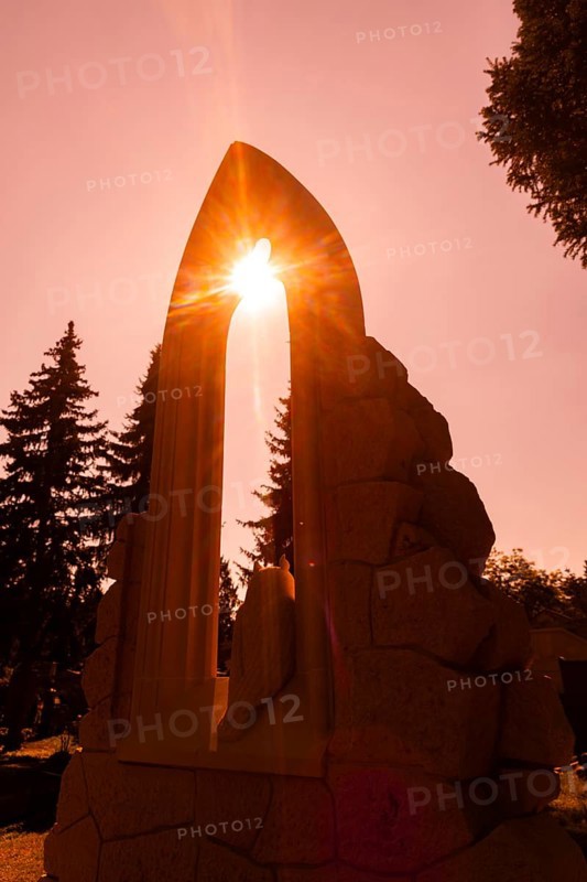 A new monument can be seen at Caspar David Friedrich's grave in Dresden's Trinitatisfriedhof cemetery to mark the 250th birthday of the most famous Romantic artist. The Gothic church window made of sandstone with an owl in rear view on the ledge. The construction was supported by the actor and Friedrich admirer Tom Pauls, who freely adapted the work from Friedrich's grave, Caspar David Friedrich, Dresden, Saxony, Germany, Europe