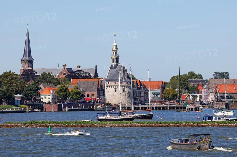 City view of Hoorn from the Markermeer, historic city centre with Hoofdtoren tower and Grote Kerk church (rear), Hoorn, North Holland, West Friesland, Netherlands