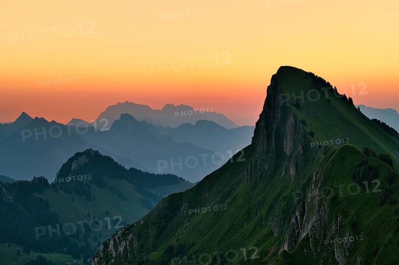 Tierberg at dawn, behind it the Appenzell Alps with Alpstein, cantons of Glarus and St. Gallen, Switzerland, Europe