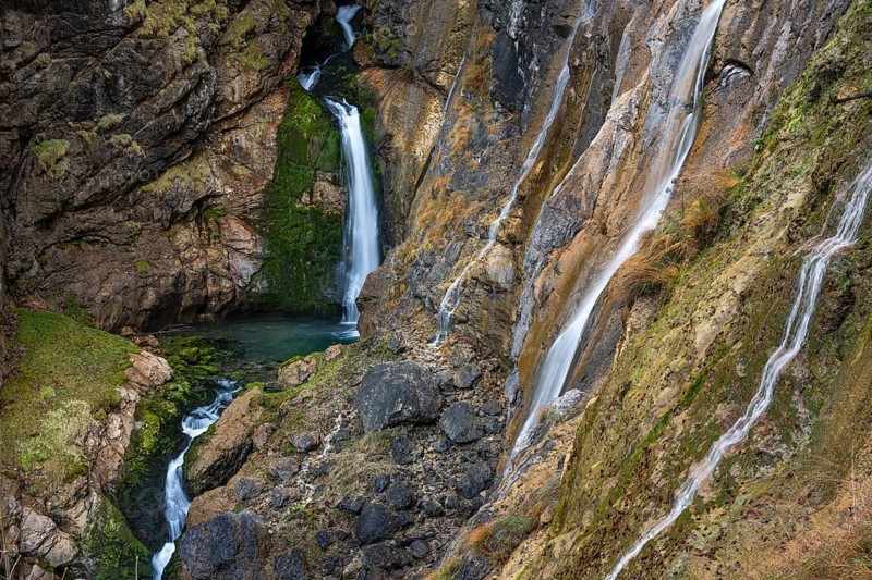 Nature in the Echerntal. The Waldbachstrub waterfall in the Strubklamm gorge. Rocks with moss. Autumn. Hallstatt, Salzkammergut, Upper Austria, Austria, Europe