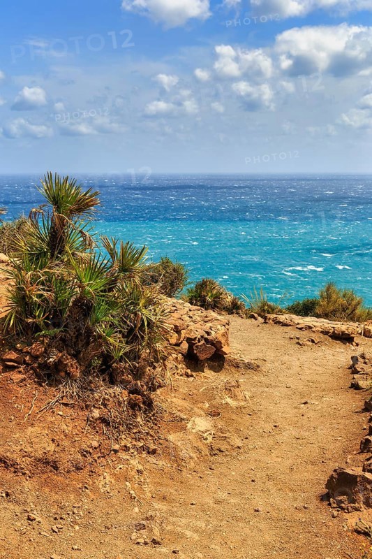 Hiking trail at Mirador de La Amatista with views of turquoise sea, coastline at La Isleta, sunny weather, Almeria, Cabo de Gata, Cabo de Gata-Nijar, Spain, Europe