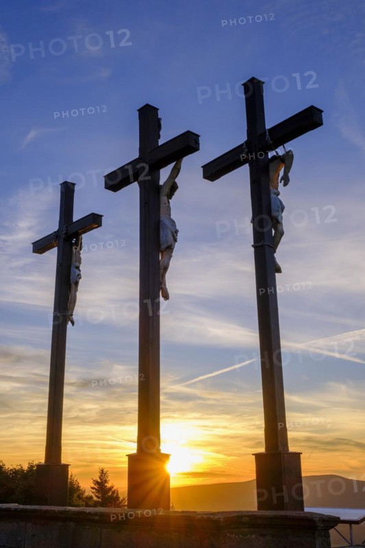 Sunset, crucifixion group, three crosses on the Kreuzberg in the Rhön, Kreuzberg near Bischofsheim, Rhön, Lower Franconia, Bavaria, Germany, Europe