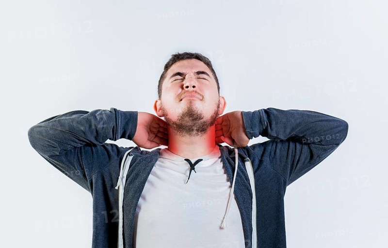 Sore person with neck pain isolated. Neck pain and stress concept