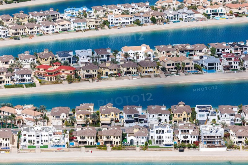 Artificial island in the shape of a palm tree The Palm Jumeirah with luxury villas properties in Dubai, United Arab Emirates, Asia