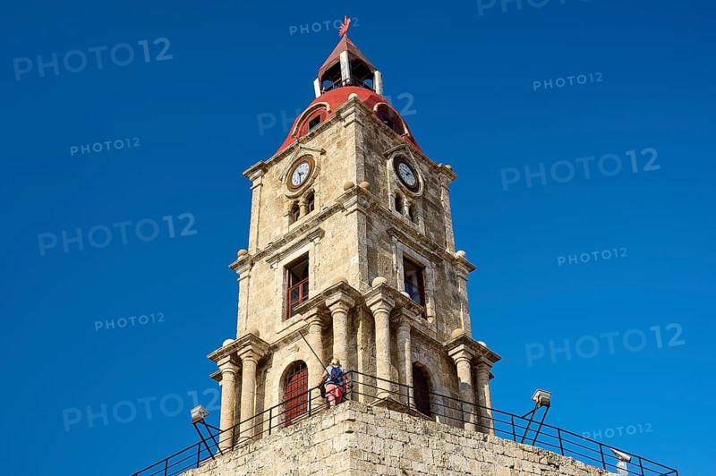 Clock Tower, Historic consecrated tower with clock and red roof, under a clear blue sky, dominant and striking, Rhodes Old Town, Rhodes Town, Rhodes, Dodecanese, Greek Islands, Greece, Europe