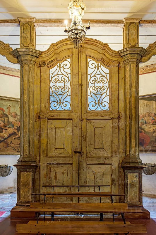 Baroque wooden portal inside a historic church in the city of Ouro Preto in Minas Gerais, Ouro Preto, Minas Gerais, Brazil, South America