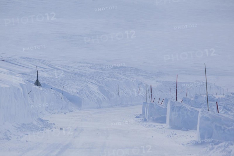 Snow-covered road, snow drifts, winding, winter, Finnmark, Norway, Europe