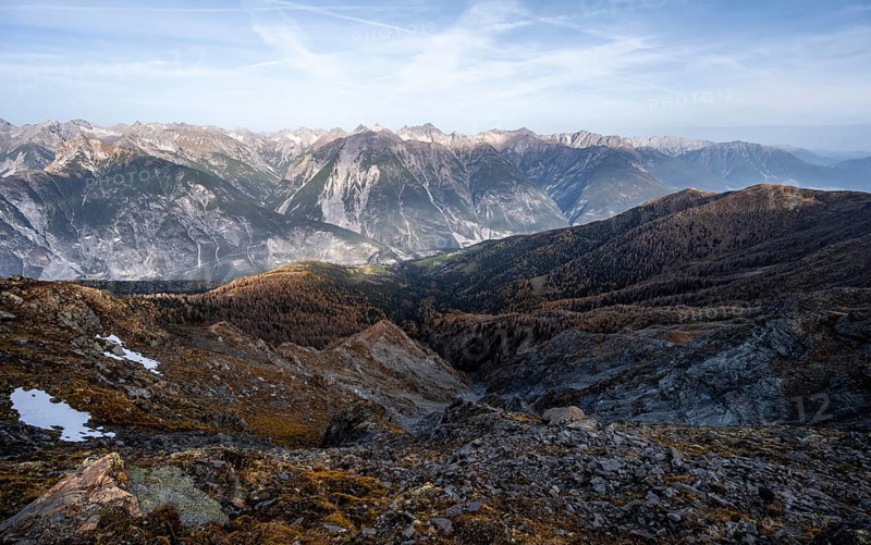 View from the ridge of the Venet to the mountain panorama of the Parzinn Group of the Lechtal Alps, yellow larches in autumn, Venet crossing, Ötztal Alps, Tyrol, Austria, Europe