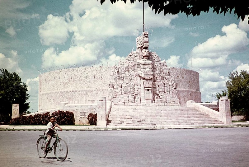 Boy riding a bicycle at the Monumento a la Patria, Monument to the Homeland, Paseo de Montejo, Merida, Yucatan, Mexico, around 1961, created by Rómulo Rozo, Central America