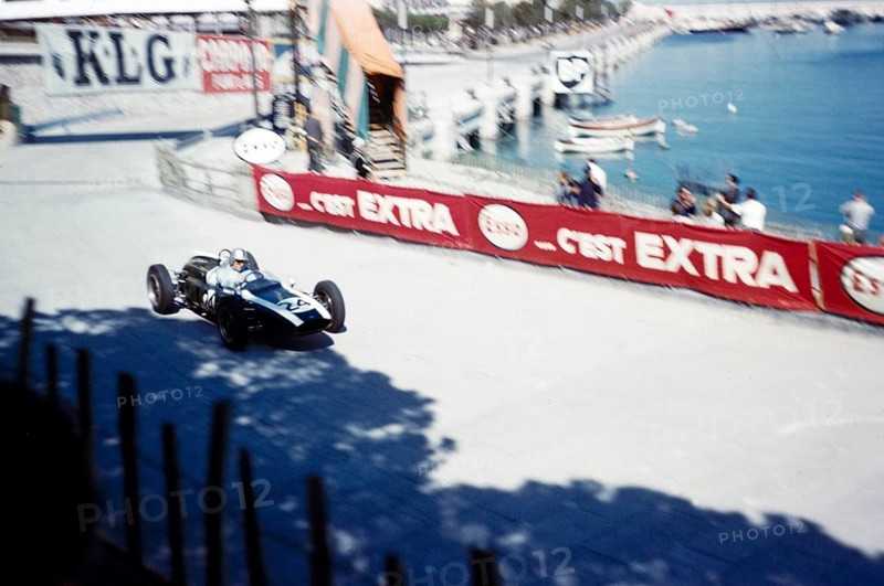 Formula 1, Monaco Grand Prix, 14 May 1961, Jack Brabham in the corner of a Cooper Climax tobacco shop