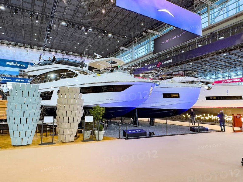 View of exhibition stand with luxury yacht superyacht ship boat in front Azimut Fly 53 behind Azimut Fly 62 in exhibition hall of public fair boot Düsseldorf, Düsseldorf, North Rhine-Westphalia, Germany, Europe