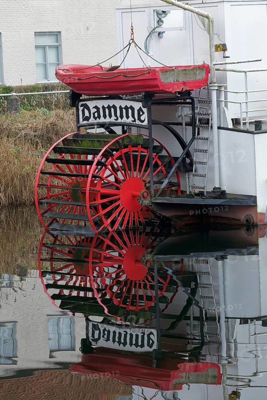 Red paddle wheel and red lifeboat, nostalgic paddle steamer Lamme Goedzack on the canal from Damme to Bruges, Damme, West Flanders, Flanders, Belgium, Europe