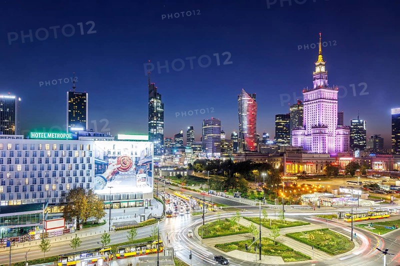 Warsaw skyline skyscrapers with Palace of Culture in the city centre at night in Warsaw, Poland, Europe