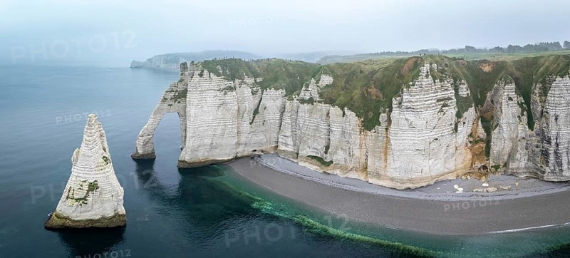 Aerial view of La Porte d'Aval and l'Aiguille on the Alabaster Coast in light fog, Etretat, Normandy, France, Europe