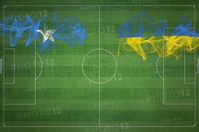 Somalia vs Ukraine Soccer Match, national colors, national flags, soccer field, football game, Competition concept, Copy space