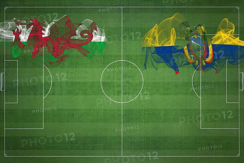 Wales vs Ecuador Soccer Match, national colors, national flags, soccer field, football game, Competition concept, Copy space