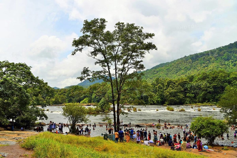 People bathing, Chalakudy River, Vazhachal Forest, Thrissur, Kerala, India, Asia