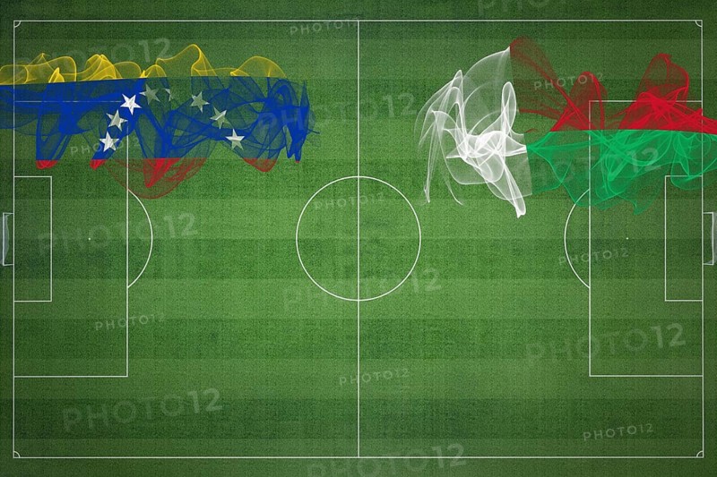 Venezuela vs Madagascar Soccer Match, national colors, national flags, soccer field, football game, Competition concept, Copy space